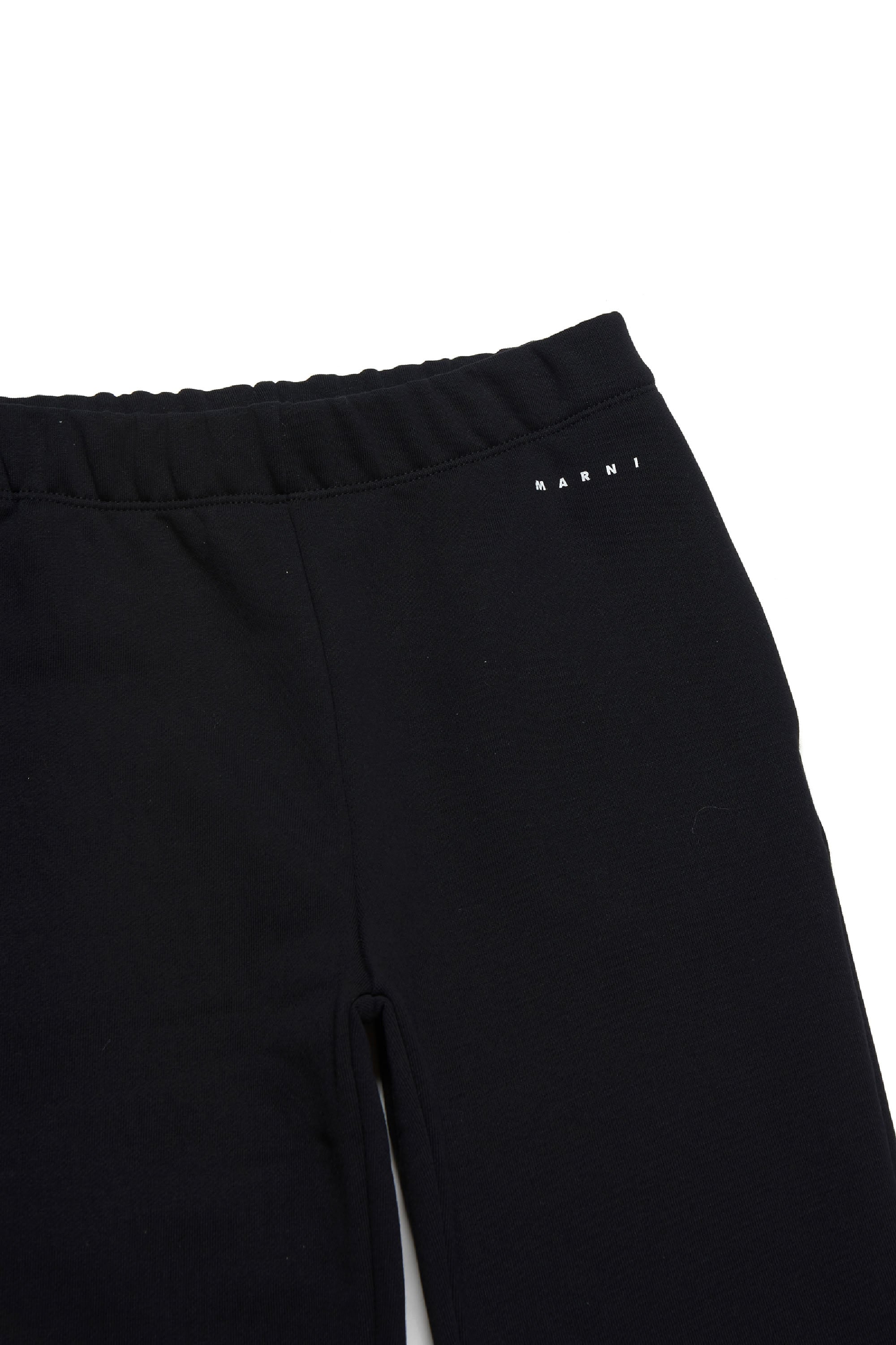 Flared trousers with ruffles - Black