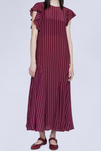 ROBE MIDI À POIS AVEC DÉTAIL VOLANT SUR LE CÔTÉ