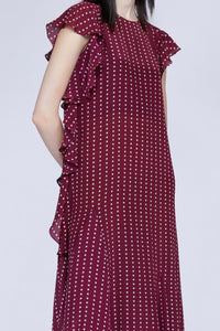 ROBE MIDI À POIS AVEC DÉTAIL VOLANT SUR LE CÔTÉ