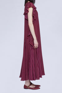 ROBE MIDI À POIS AVEC DÉTAIL VOLANT SUR LE CÔTÉ