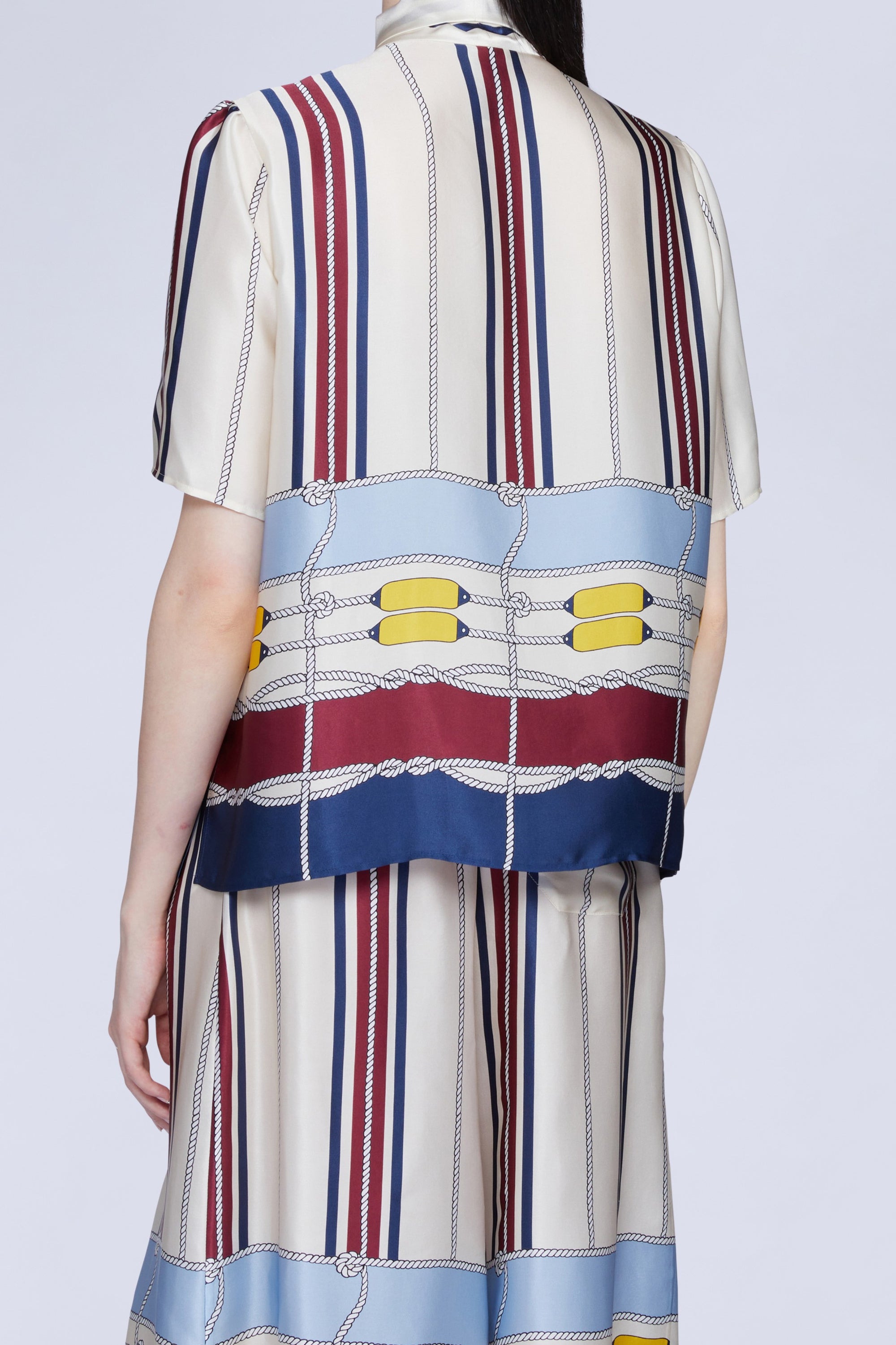 CHEMISE MANCHES COURTES IMPRIMÉ PASSEPOIL ET NŒUD AU COL
