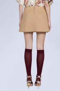 MINI JUPE AVEC BOUTONS OR