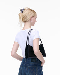 THE CLAW CLIP SHOULDER