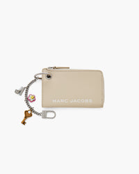 THE COIN PURSE CHARM
