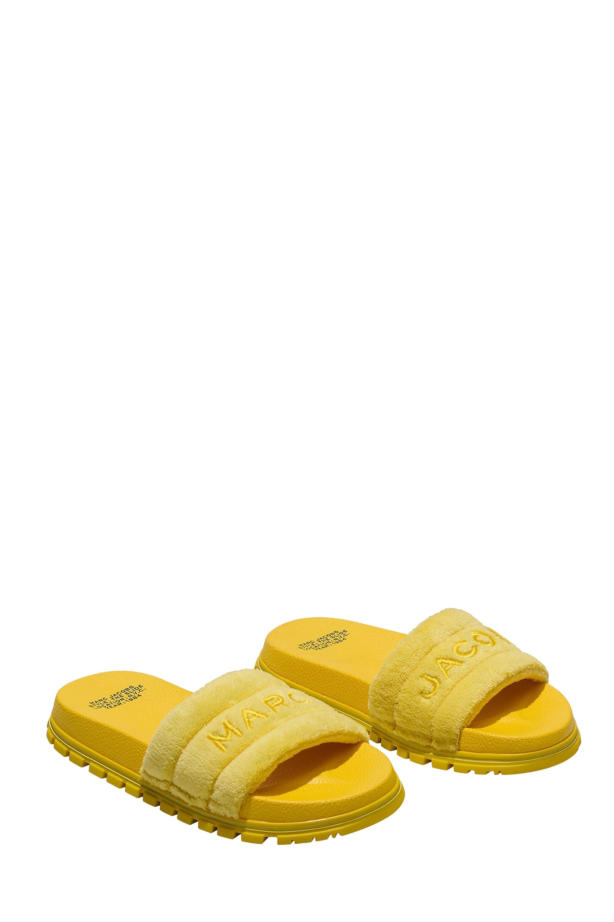 Mules plates avec logo en fausse fourrure - Golden Kiwi