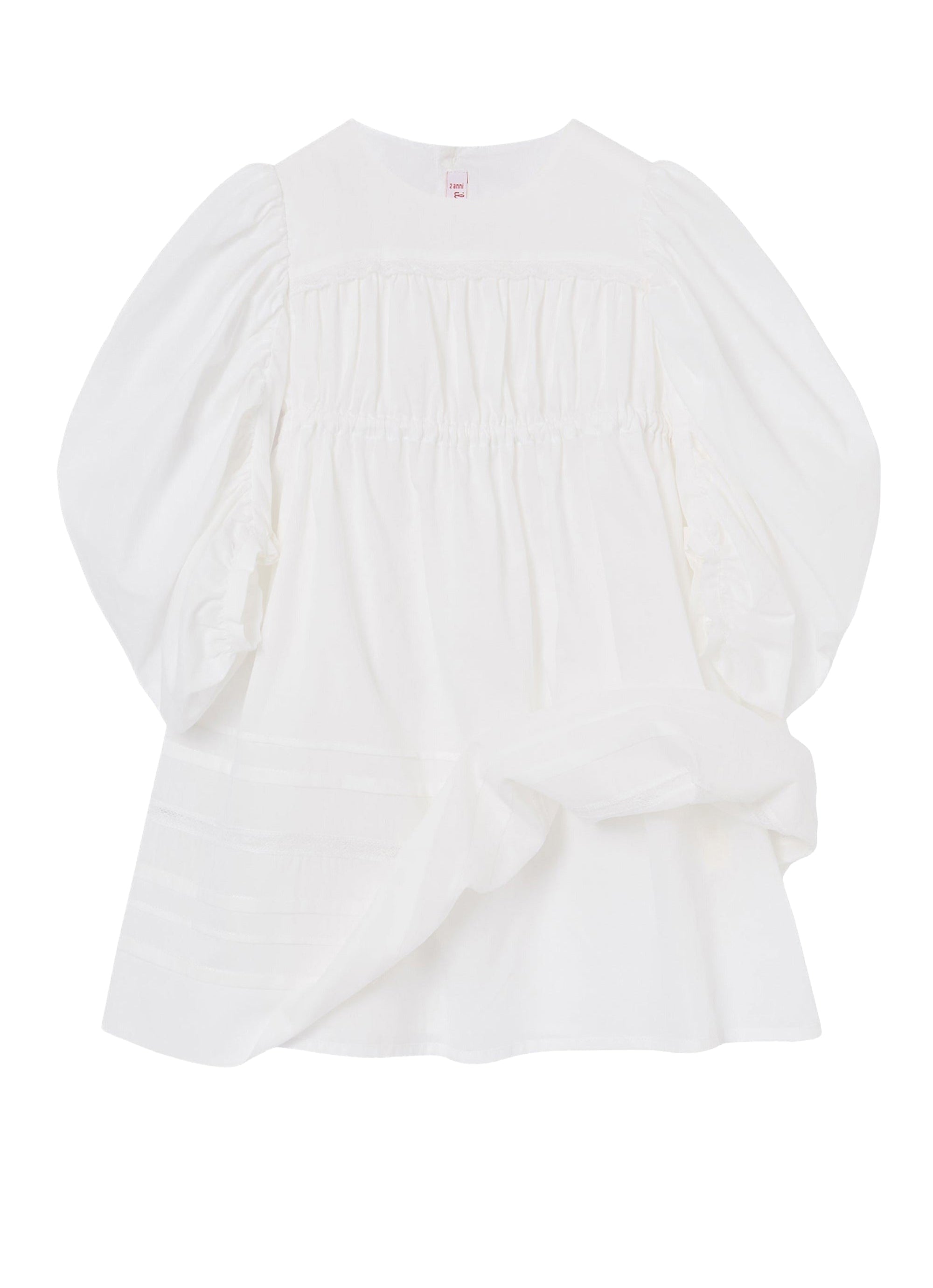 vestito bianco con maniche lunghe