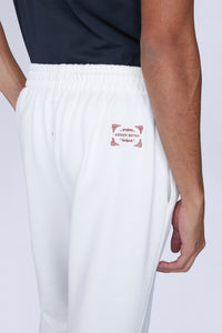Pantalon blanc avec revers