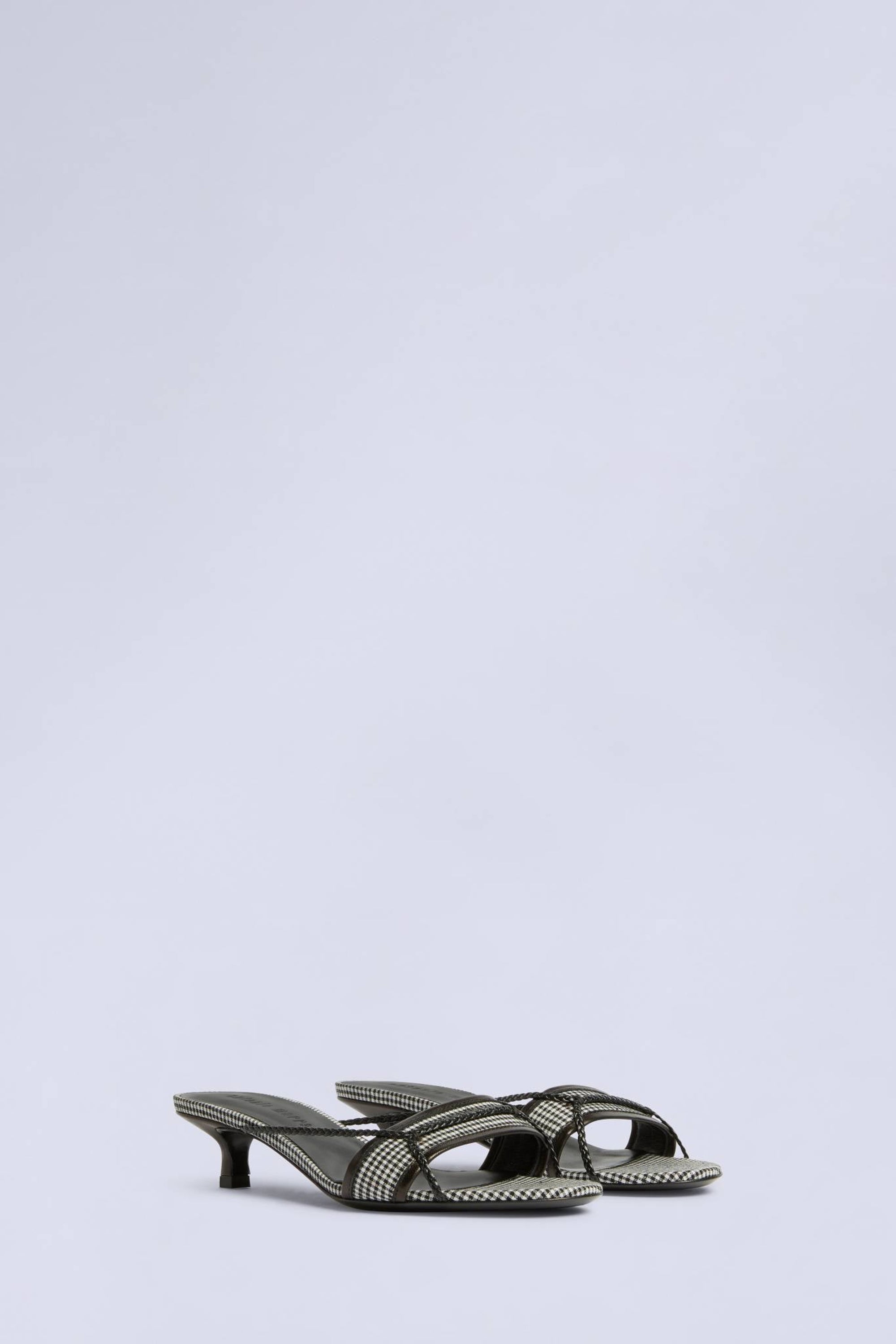 Mules ouvertes micro-talon à carreaux en laine - Nero Fantasia Bianco