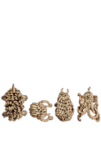Set of 4 Haas Monster Ball brass napkin rings - Gold