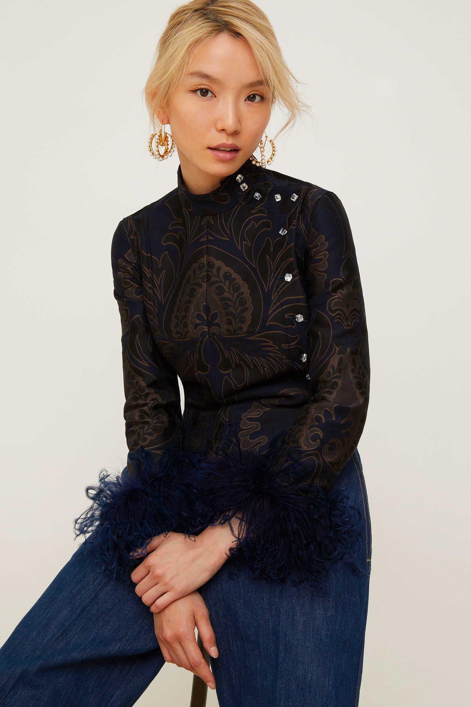 Jacquard jacket with feathers
  - Amber