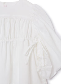 vestito bianco con maniche lunghe