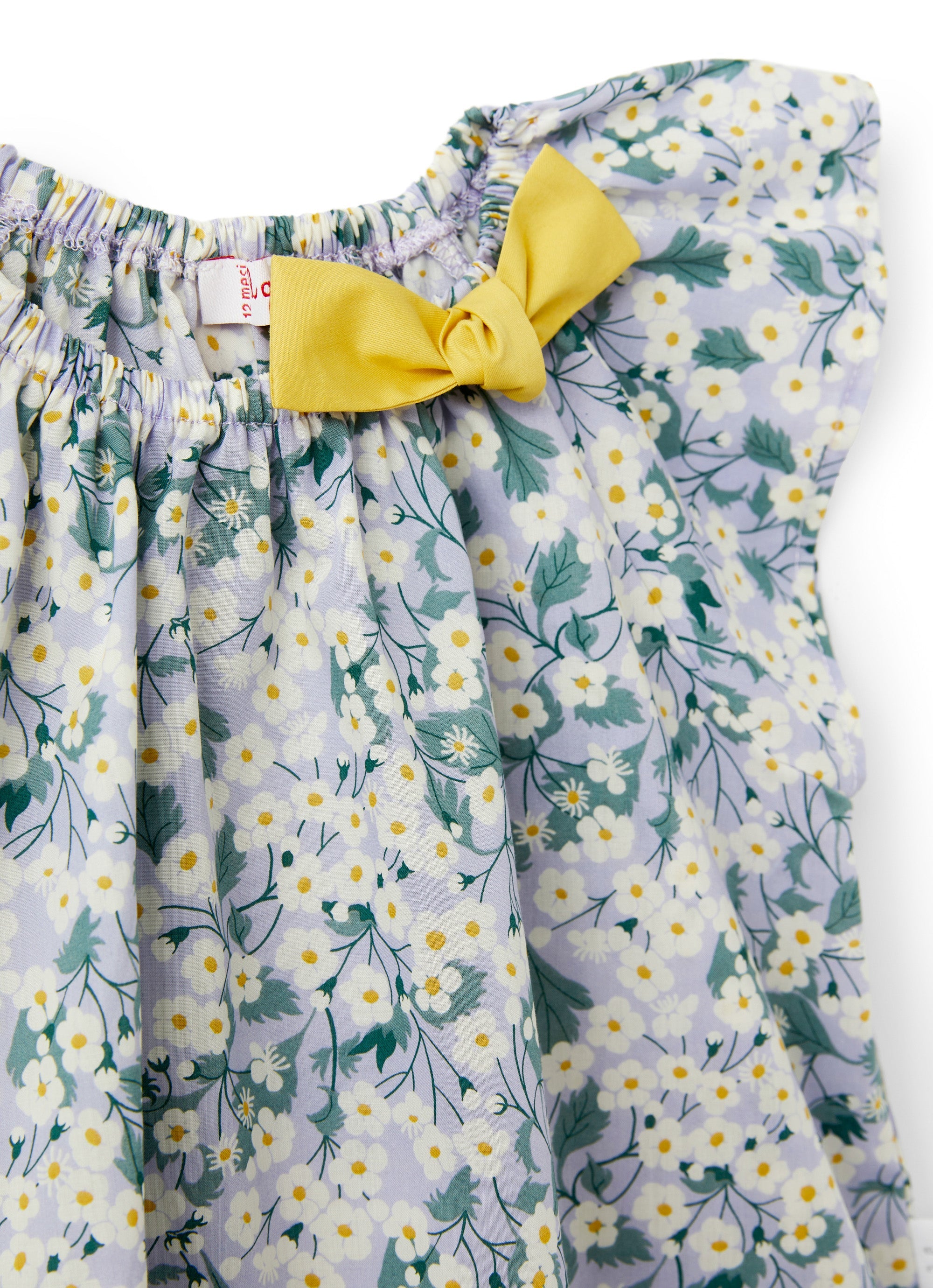Top con stampa a fiori e fiocco
