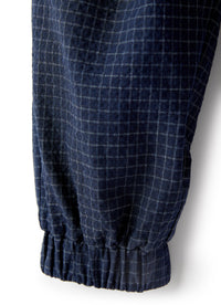 Pantaloni baggy in seersucker a quadretti