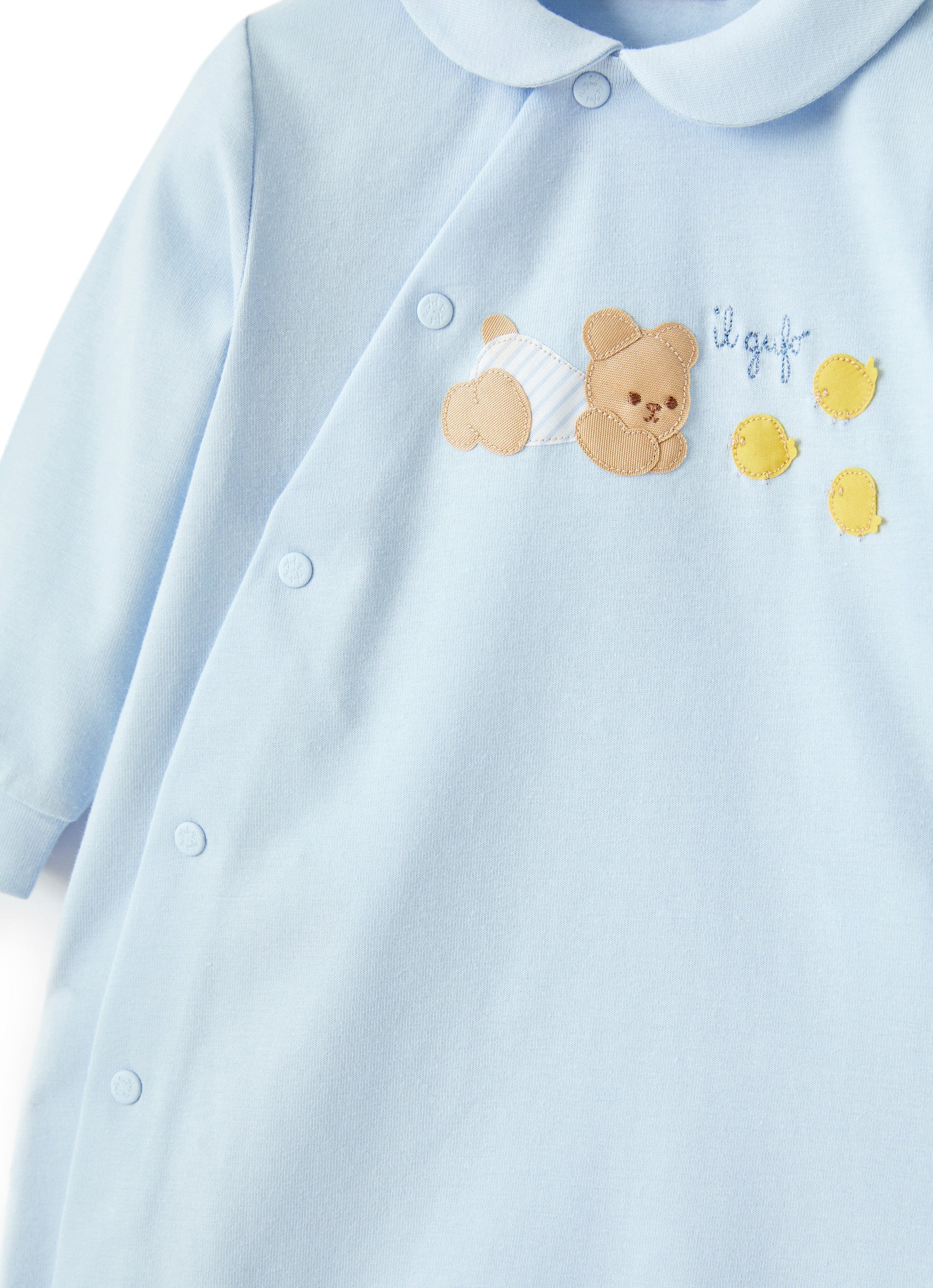 Tutina in jersey azzurro con orsetto