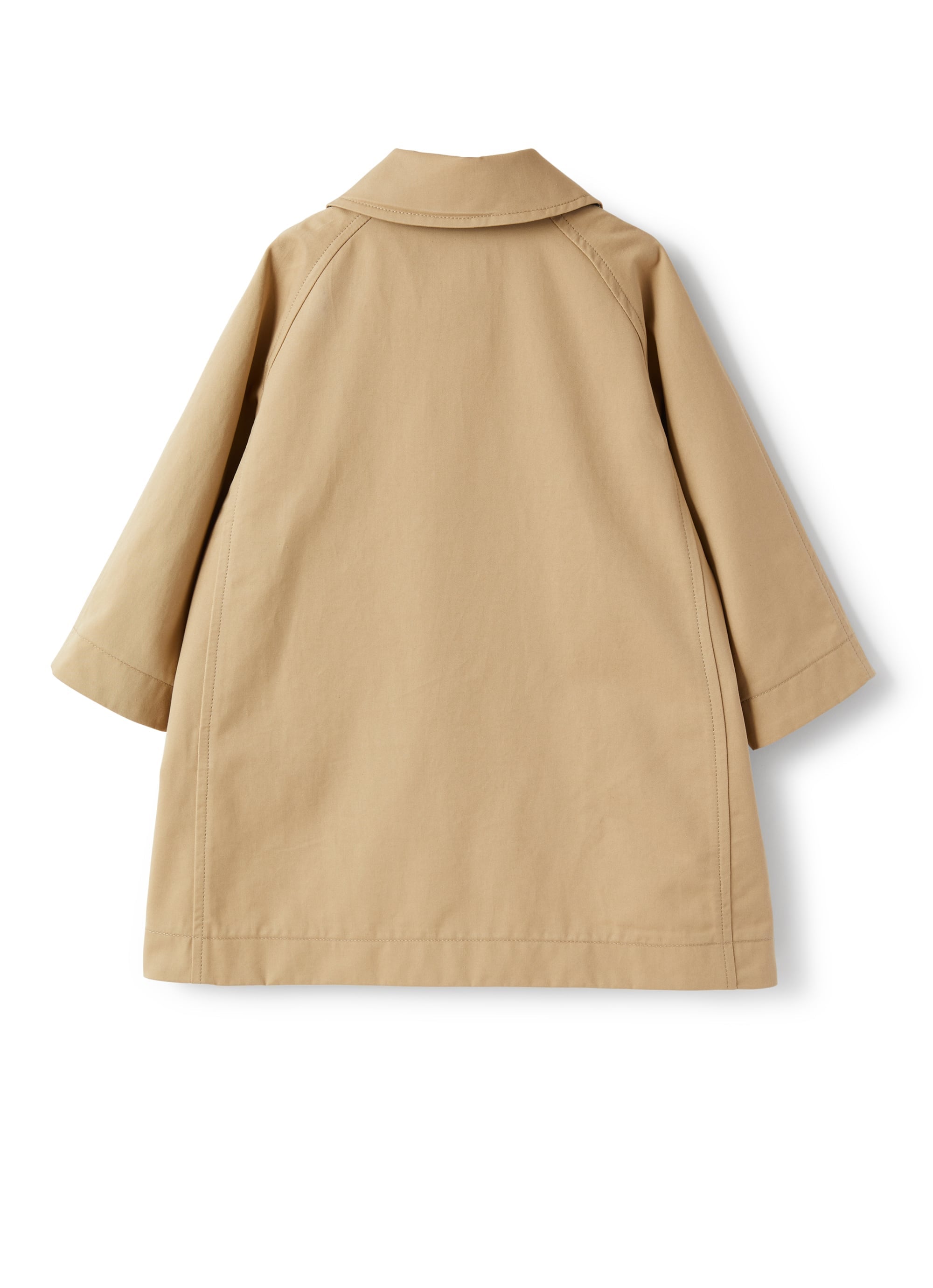 Trench in gabardina e profili floreali