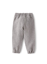 Pantalone carrot fit in lino grigio