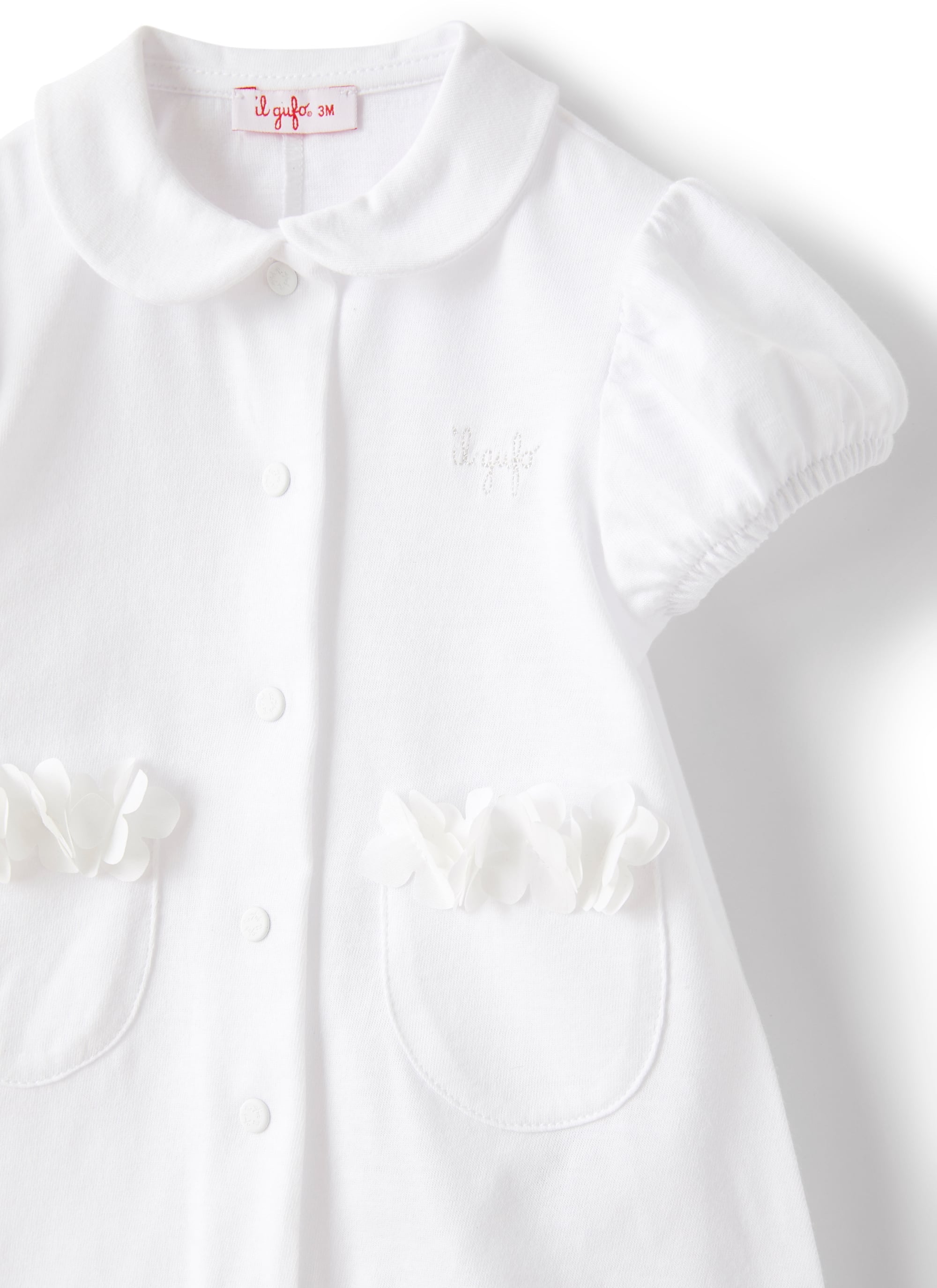 Tutina corta con applicazione fiori