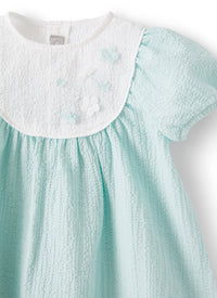 Vestito da neonata in goffratino