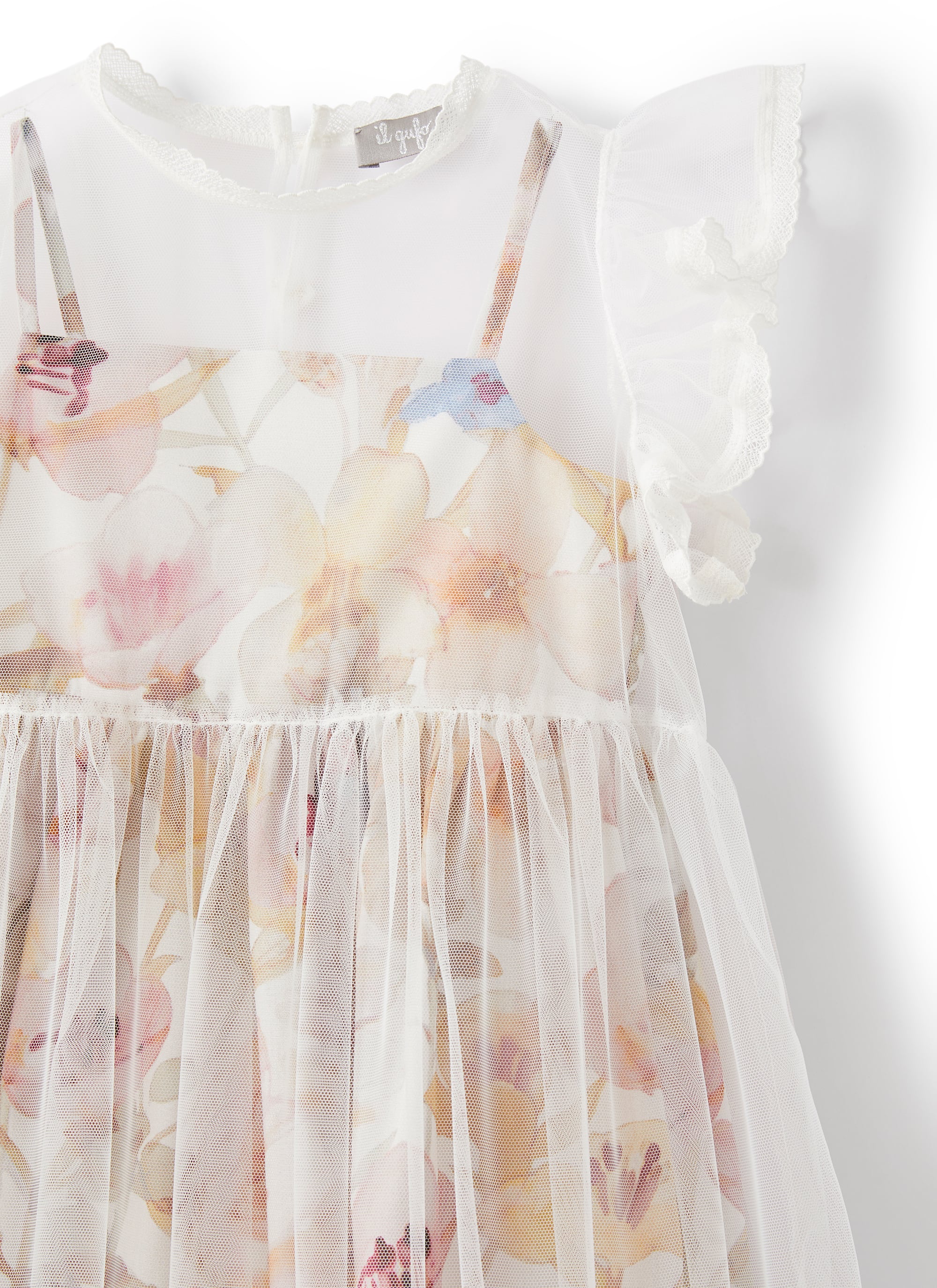 Vestito in tulle bianco con fiori