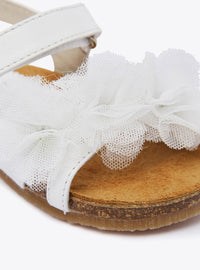 Cross-strap sandals in leather - White