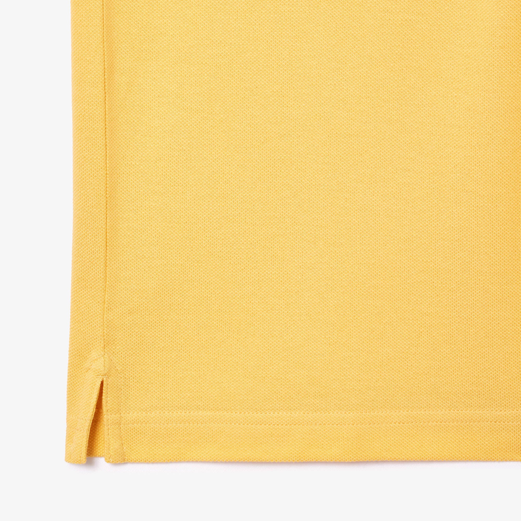 L.12.12 fitted polo shirt in small pique - Cornsilk