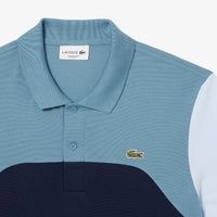 Polo coupe droite L.12.12 à broderie en piqué - Marine & Calcaire