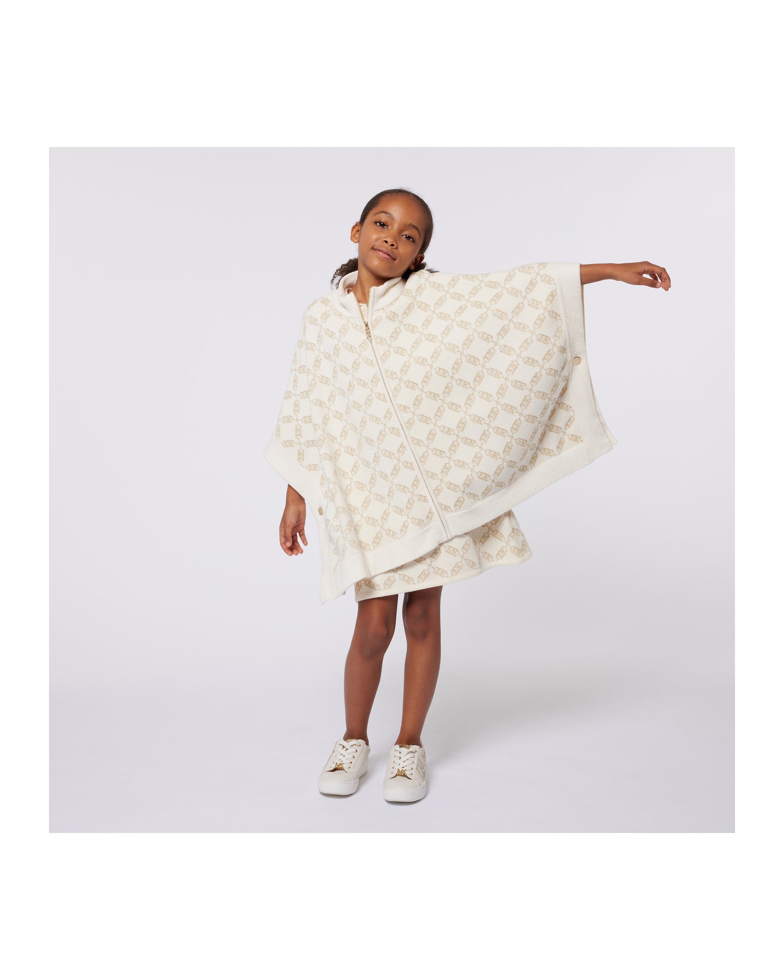 Cape with knitted logo - Rice