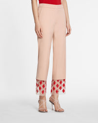 Pantalon de tailleur évasé en laine - Ivoire Rosé
