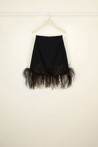 Jupe courte en tweed à plumes - Noir