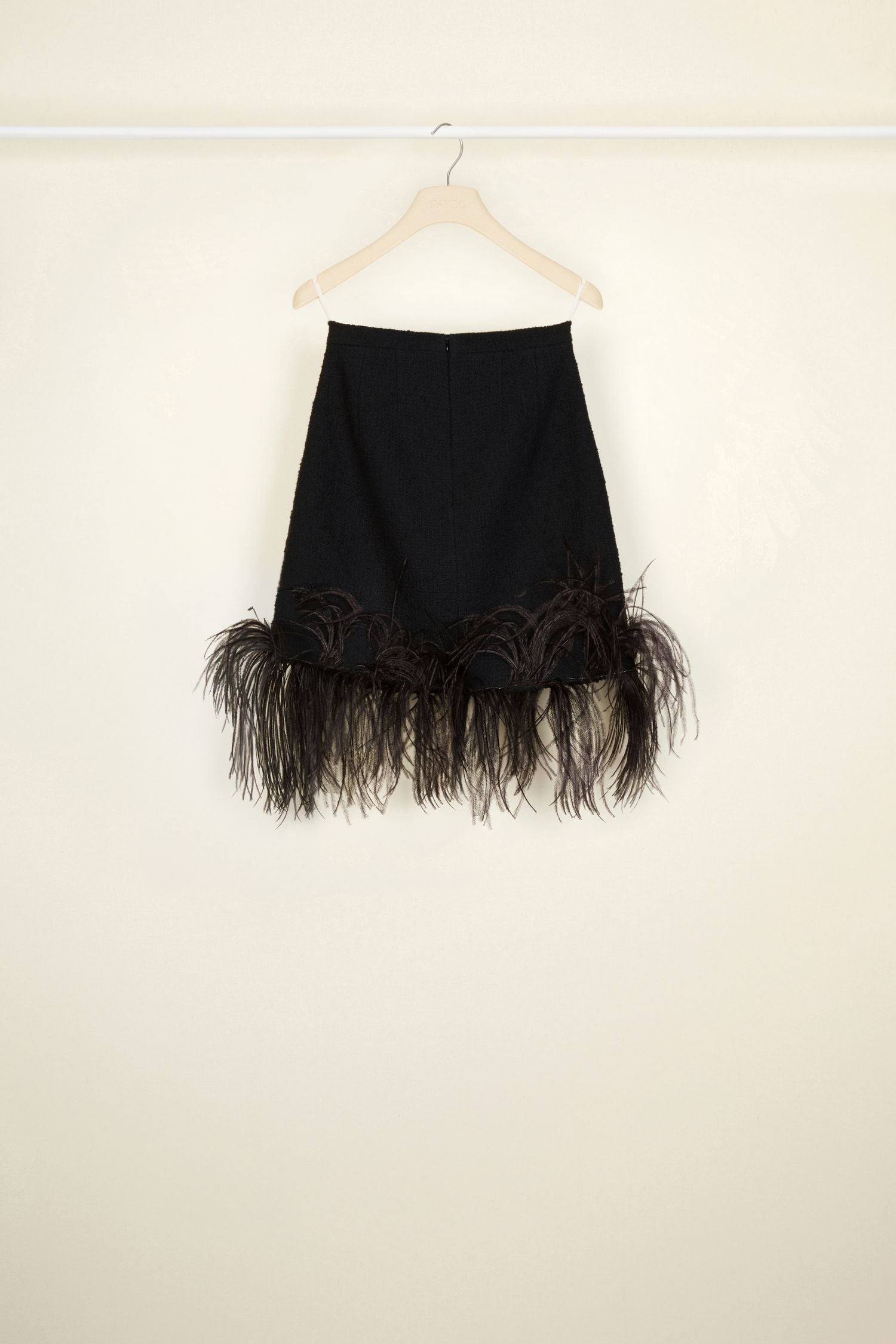 Jupe courte en tweed à plumes - Noir