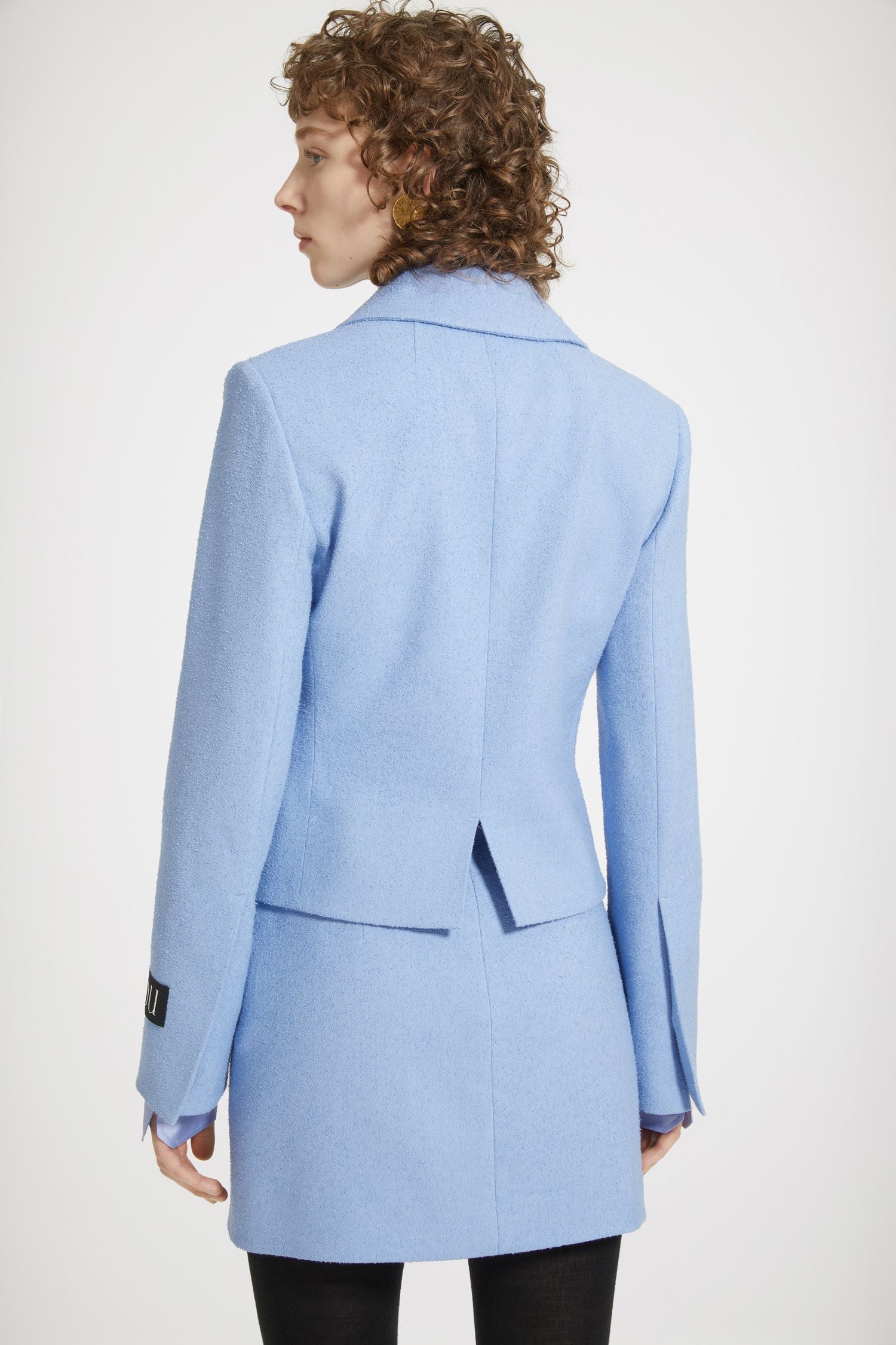 Jupe courte en tweed stretch