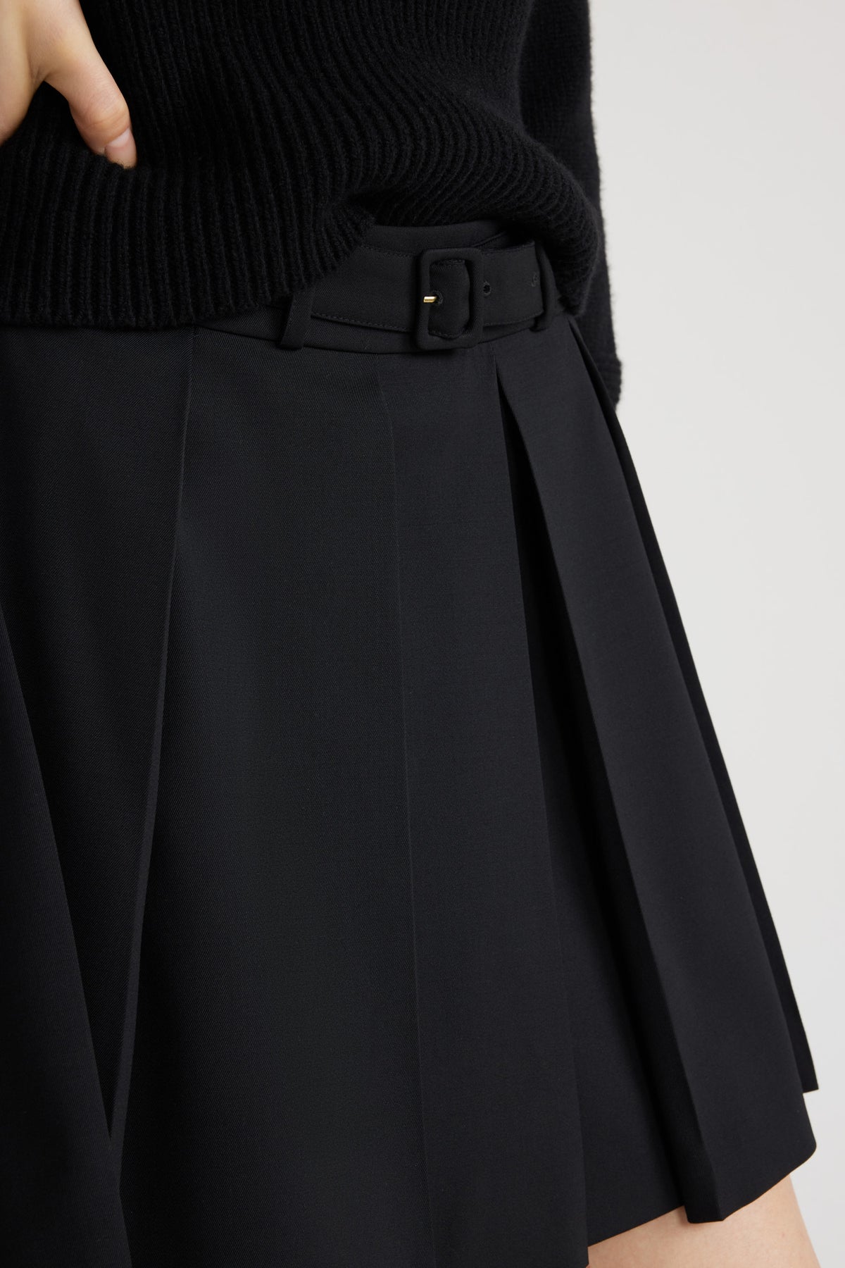Black / Mini jupe plissée en laine technique