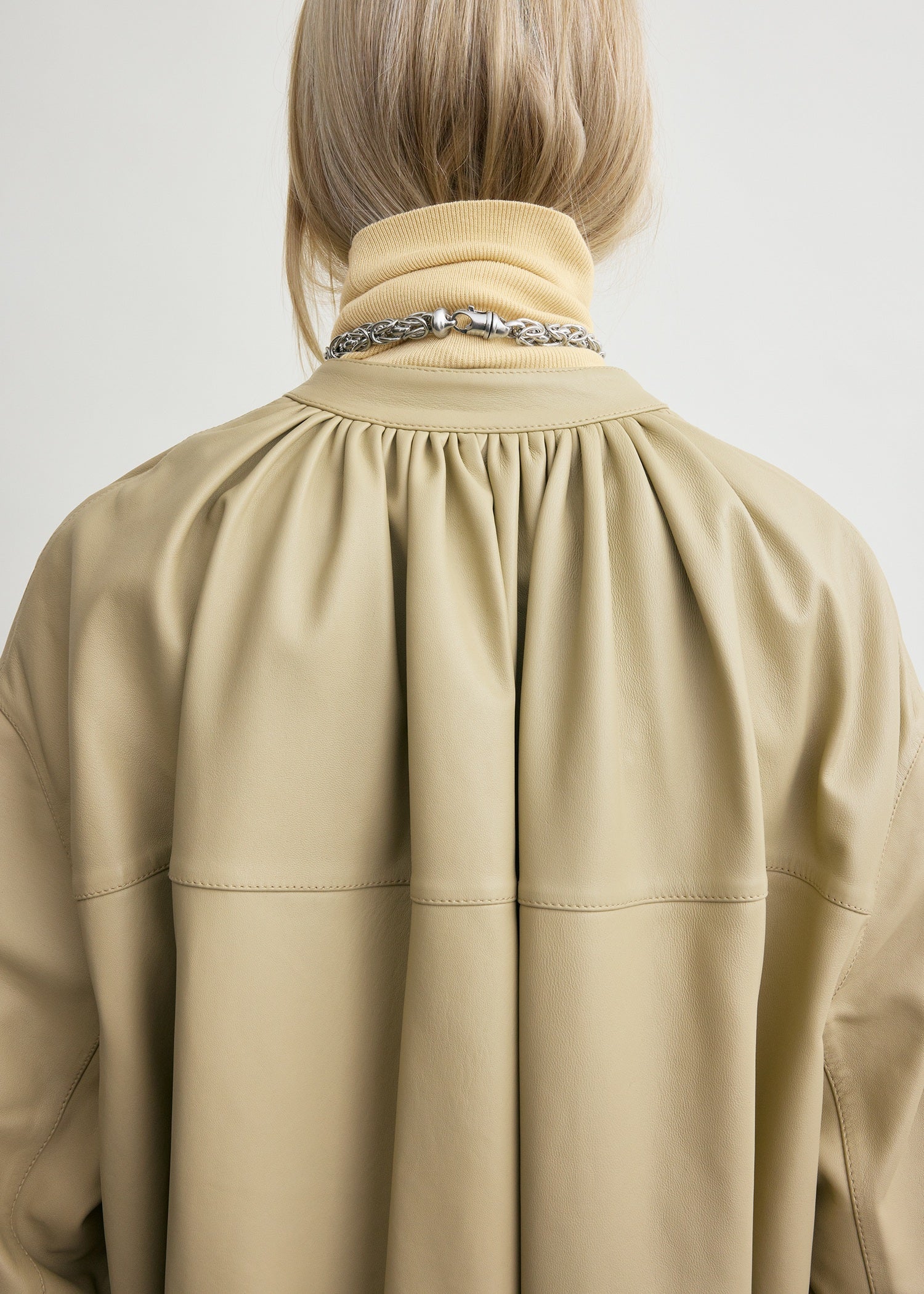 COLLARLESS LEATHER COAT