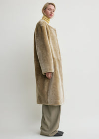 COLLARLESS SHEARLING COAT