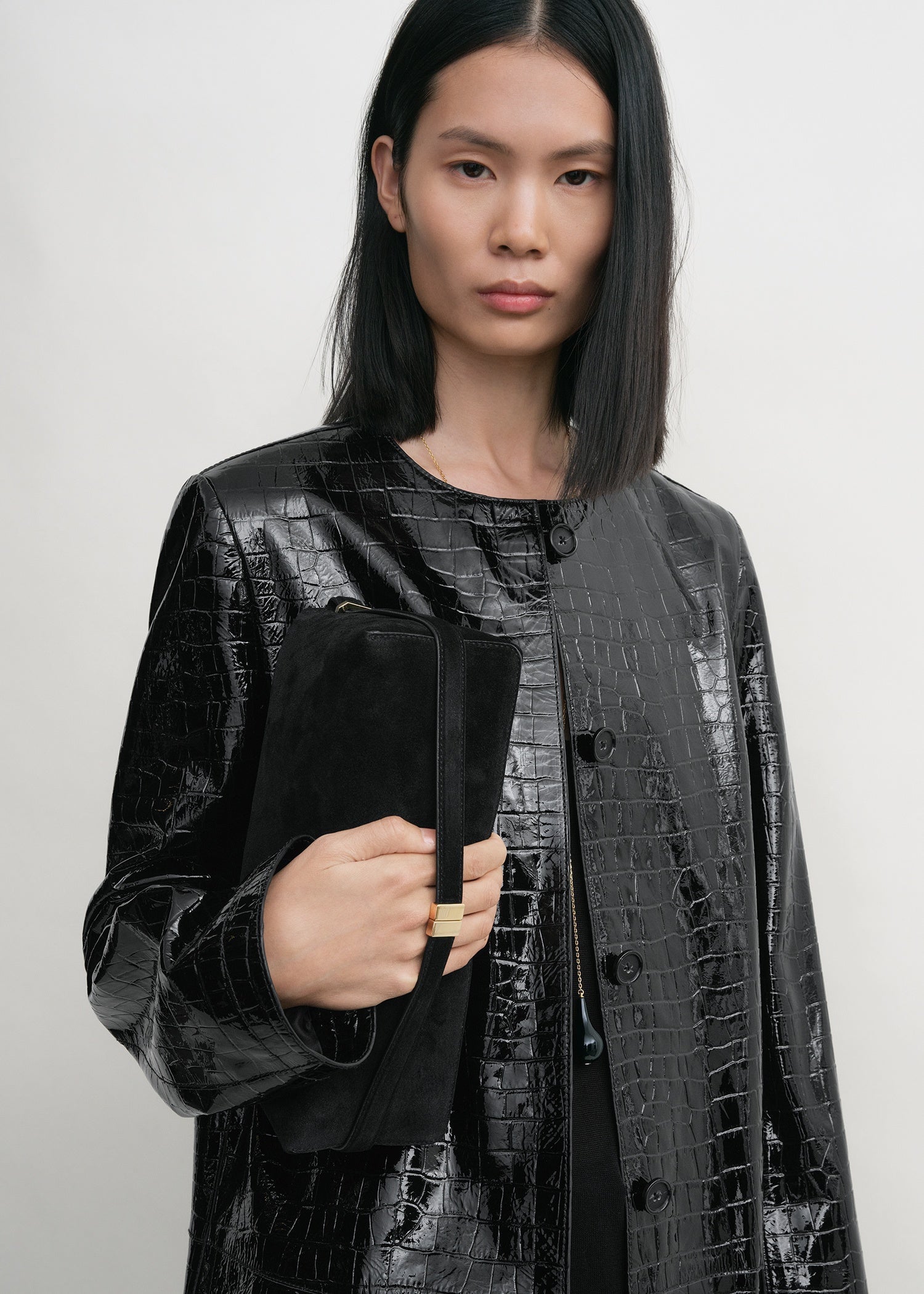 BELTED SUEDE CLUTCH