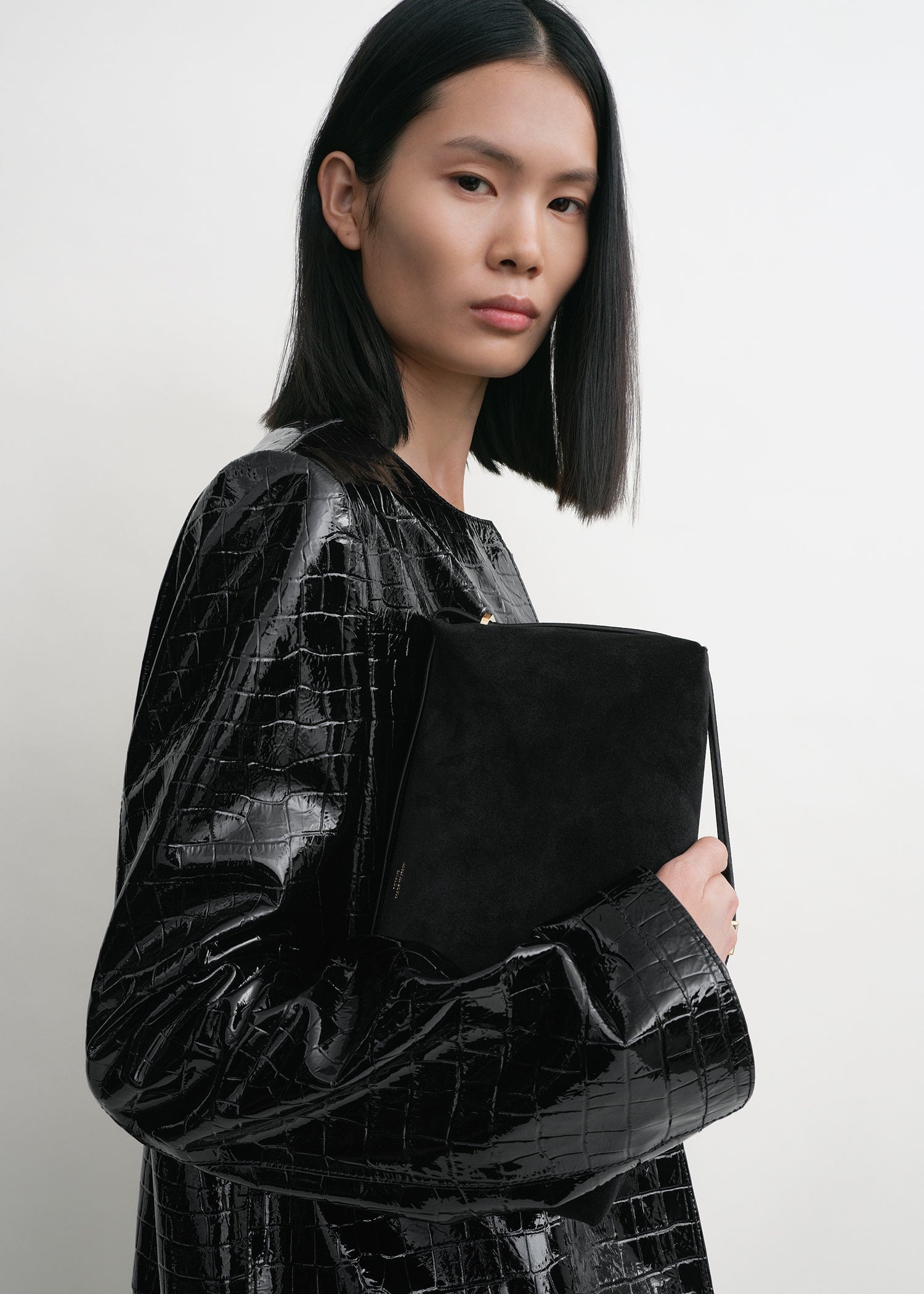 BELTED SUEDE CLUTCH