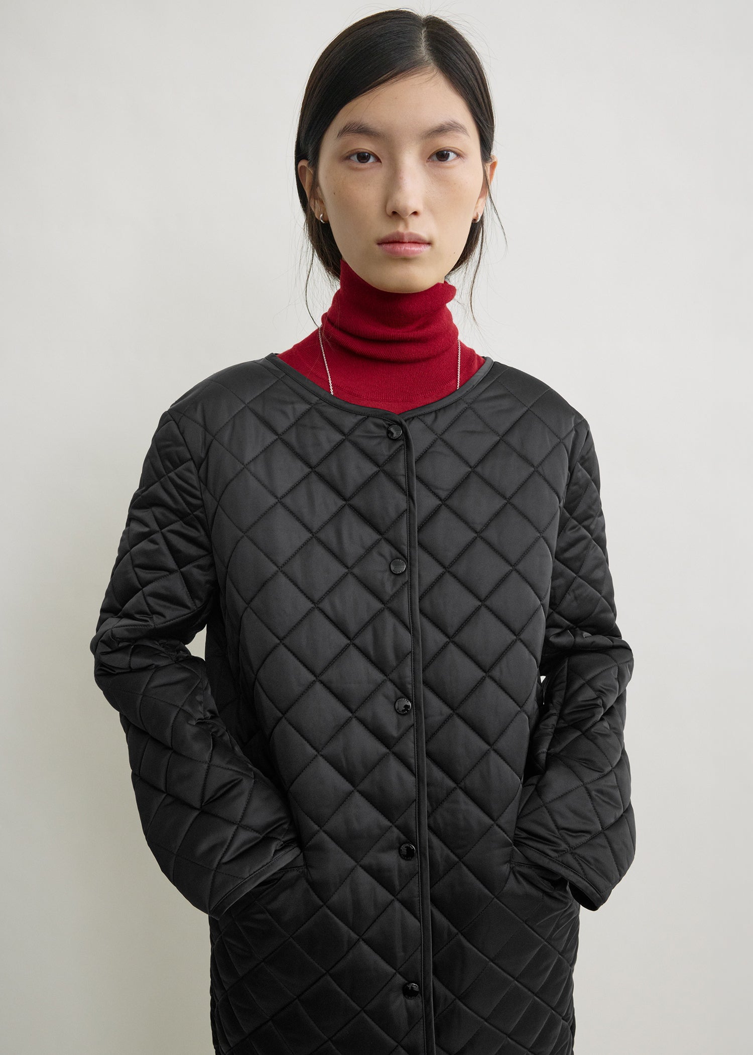 QUILTED COLLARLESS COAT
