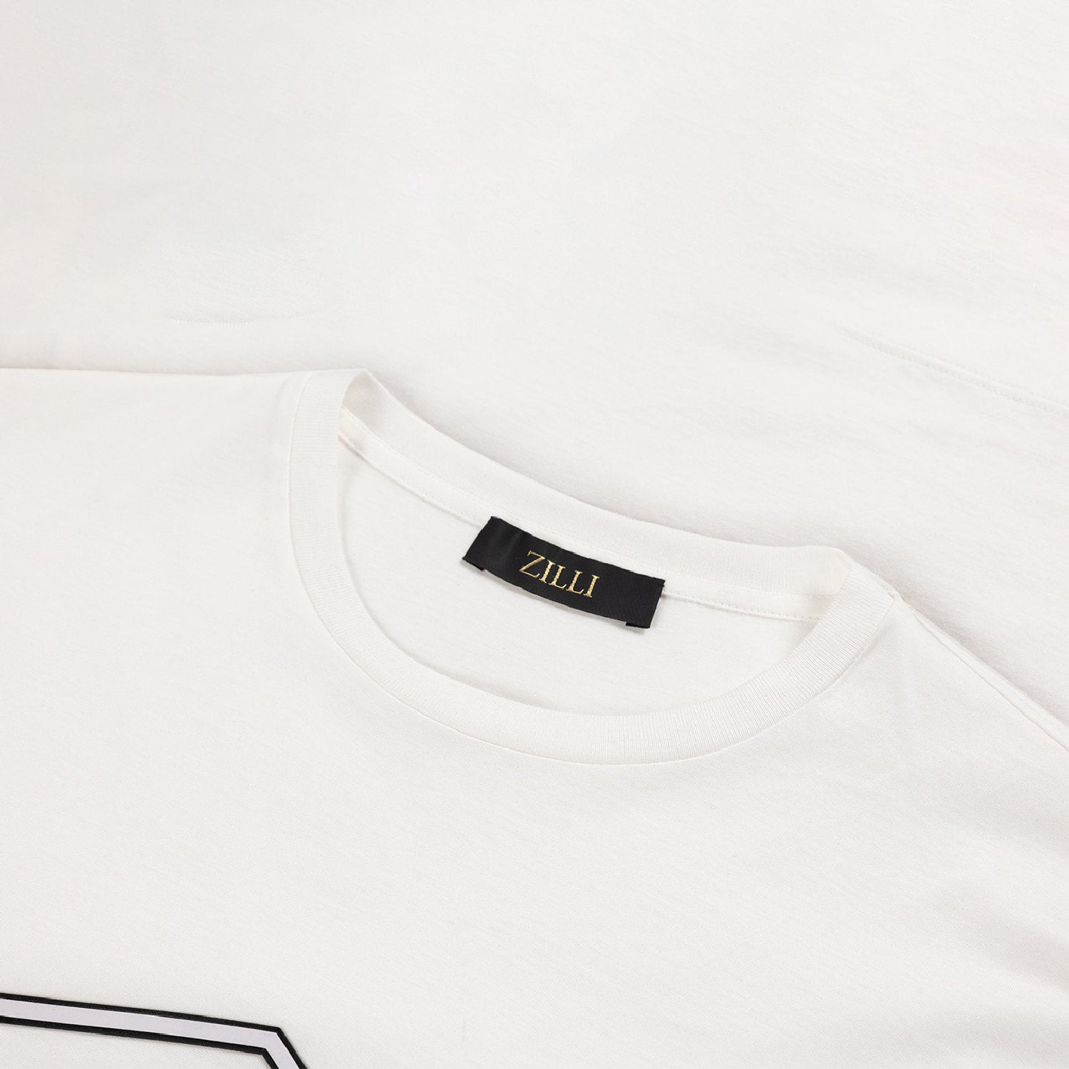 T-shirt à motif graphique brodé - Blanc