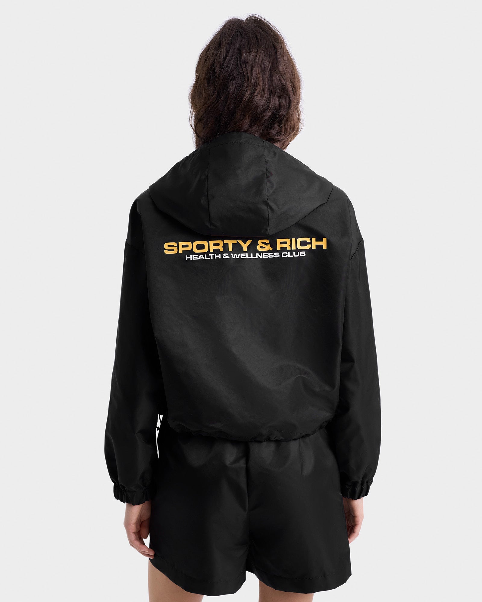 Veste coupe-vente à capuche Bold Health en satin - Black