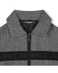 VESTE