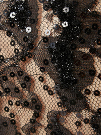 HAUT EN DENTELLE À PAILLETTES AVEC DÉCOUPE
