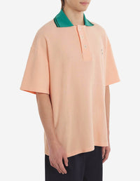 Piqué polo shirt with badge - Peach
