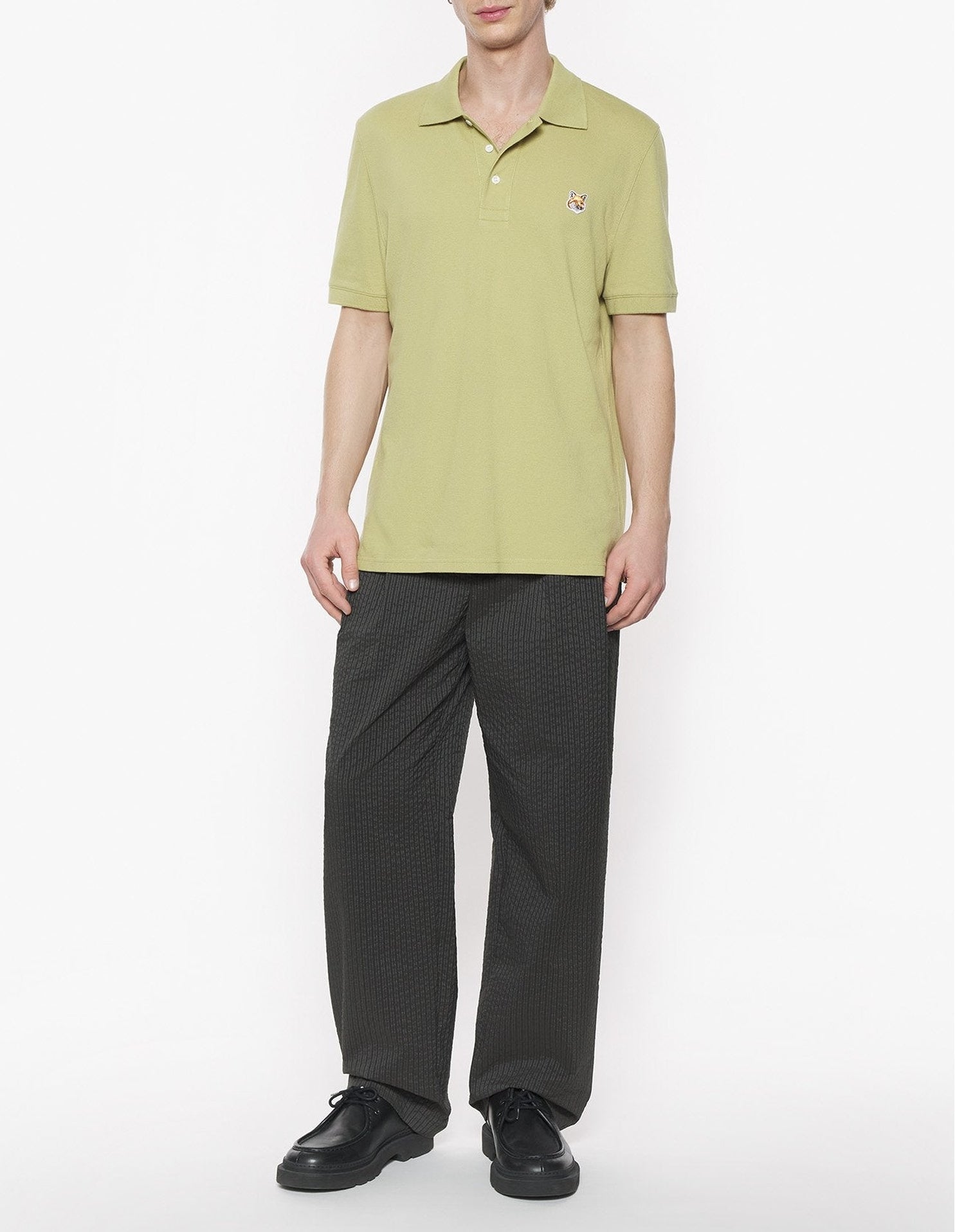 Short-sleeved polo shirt with badge - Canvas