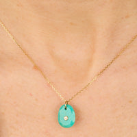 Yellow gold necklace set with diamonds - Turquoise