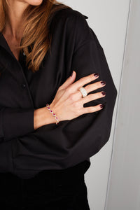 15qty DJV / QTY DISPO : 16-QTY VENDUES : 0-ST :0% PRIX DJV : 395€ // Argent Rhodié Bracelet en argent rhodié serti de rubis de synthèse taille ovale et pavée de Burmalite™ blanche taille brillant /// RECO : 338€