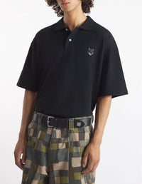 Oversized short-sleeved polo shirt with crest - Black