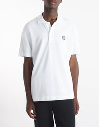Short-sleeved polo shirt with badge - White