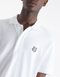 Short-sleeved polo shirt with badge - White