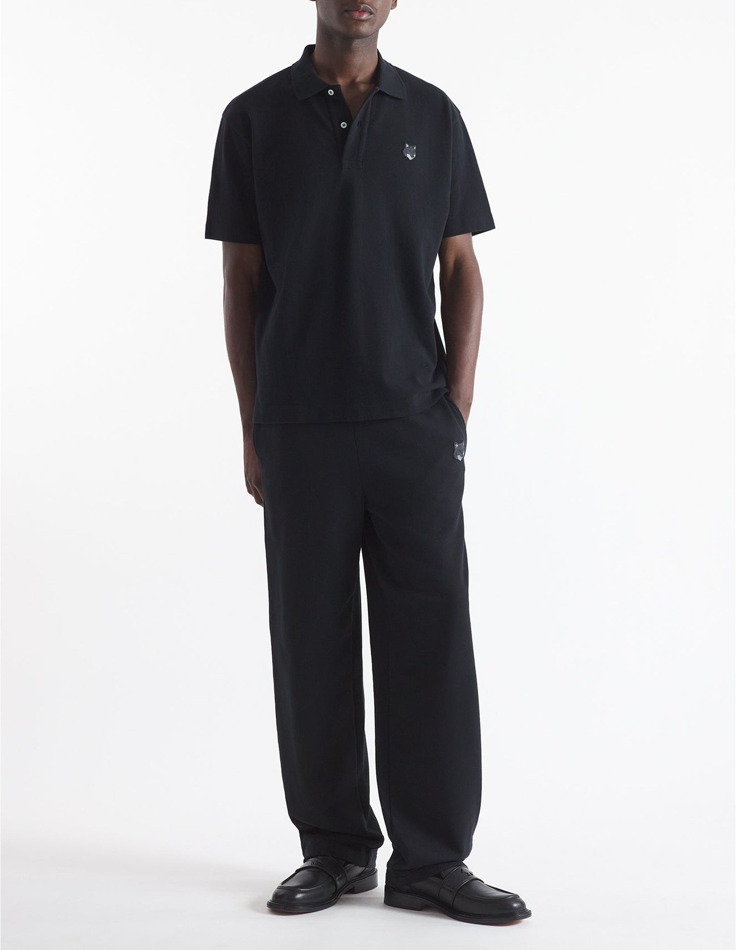 Short-sleeved polo shirt with badge - Black