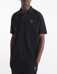 Short-sleeved polo shirt with badge - Black